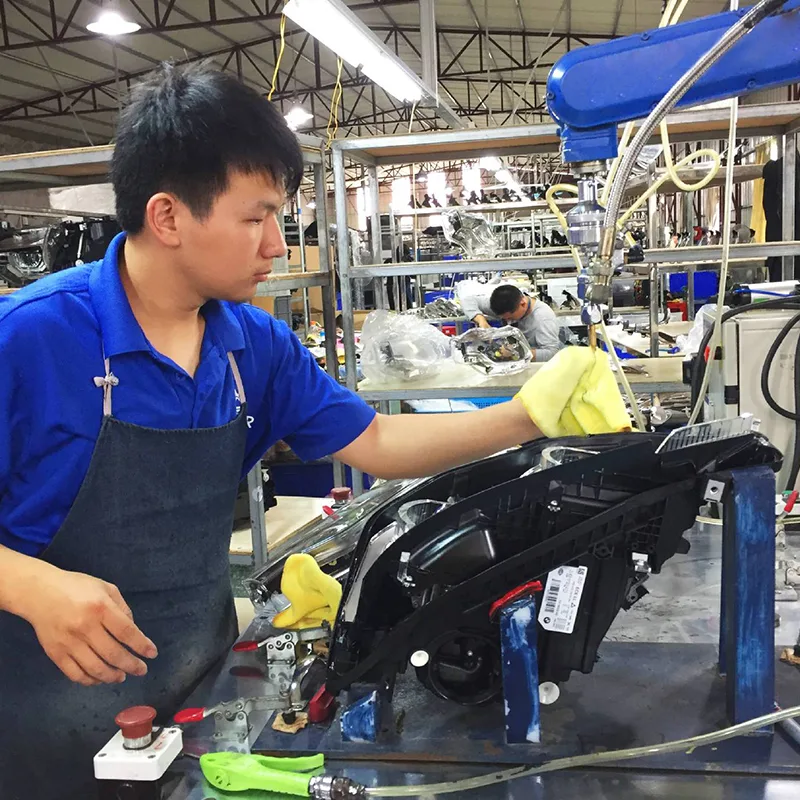 One step of production of headlight housing